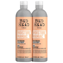 Dois frascos de condicionador hidratante da linha Bed Head da TIGI, com rótulos em tons de laranja e cinza, apresentando o nome "Moisture Maniac" e informações sobre o produto.