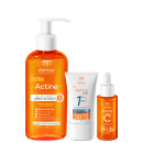 Produtos da linha Actine da Darrow: gel de limpeza dermatológico, protetor solar Actine One FPS 50 e sérum concentrado de vitamina C, em embalagens com cores predominantes laranja e branca.