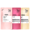 Dois pacotes de máscaras da L'Oréal Professionnel, Vitamino Color e Prolonger, com embalagens rosa e branca. Também há um pacote de shampoo Absolut Repair da mesma marca.