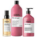 Três produtos da linha L'Oréal Professionnel: um frasco de óleo Absolut Repair, um frasco de shampoo Pro Longer e um frasco de condicionador Pro Longer, com embalagens em tons de rosa e dourado.