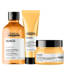 A imagem mostra três produtos da linha NutriOil da L'Oréal Professionnel. O primeiro é um shampoo em um frasco plástico âmbar. O segundo é um creme nutritivo em um tubo retangular amarelo. O terceiro é uma máscara em um pote plástico amarelo opaco.