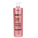 Leave-in da linha Blonde Spa da marca Essendy. A embalagem é um frasco plástico rosa com um dispensador branco na parte superior. O rótulo do produto destaca que se trata de um leave-in com reposição protetora e renovação proteica.