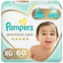 Pacote de fraldas Pampers Premium Care tamanho XG, com 60 unidades, para bebês de 11-15 kg. Embalagem com design em tons de verde e dourado, destacando a "máxima absorção" e "ajuda a prevenir assaduras".
