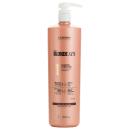 Shampoo da linha Blonde Spa da marca Essendy .O rótulo indica que se trata de um "Shampoo pH Balance", ou seja, um shampoo com pH balanceado, ideal para cabelos descoloridos. O frasco possui um dispensador na parte superior.