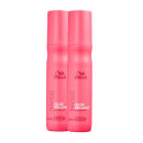 A imagem mostra dois frascos compridos de cor vermelha de leave-in de 150ml.