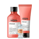 A imagem mostra um kit de produtos L’Oréal Professionnel: com shampoo (300ml), condicionador (200ml), ambos em embalagens coral, e ampola em embalagem branca.