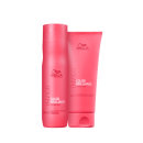 Dois produtos da linha Wella Professionals Color Brilliance, em embalagens cilíndricas e tubulares de cor rosa vibrante, com o logotipo da marca e o nome da linha impressos.