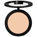 Pó compacto de maquiagem Revlon em embalagem redonda preta. A superfície do pó tem uma cor bege claro uniforme. A tampa transparente exibe o logotipo "Revlon" em letras brancas. O produto apresenta um design minimalista e elegante.