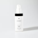 A imagem mostra um frasco branco de plástico contendo um produto da linha Gennezi. O nome "Gennezi" está impresso em letras pretas na parte frontal do frasco. O tamanho do frasco indicado é de 120ml.