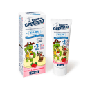 A imagem mostra a embalagem e um tubo de pasta de dente infantil da marca Pasta del Capitano. O produto é destinado para bebês e tem sabor de morango (fragola). Ambos exibem um desenho animado de uma tartaruga verde e um esquilo ao seu lado.