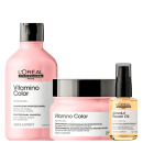 A imagem mostra o kit de produto da linha Vitamina Color de L'Oréal Professionnel. Há um shampoo, uma máscara e um frasco de óleo capilar.