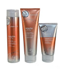 A imagem mostra três produtos da linha Youth Lock da marca Joico: shampoo, condicionador e máscara, com embalagens em tom laranja, prata e branco.