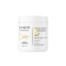 A imagem mostra uma máscara capilar que vem em um pote branco com detalhes em dourado, contendo 500g. O design da embalagem mostra elegância e sofisticação.