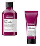 Um frasco de shampoo e um tubo de leave-in, ambos com embalagens de cor rosa escura. O frasco de shampoo possui um rótulo com o nome "Curl Expression" e informações sobre os ingredientes, como glicerina, ureia e semente de hibisco.