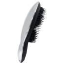 A imagem mostra uma escova de cabelo preta com costas espelhada.