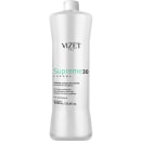 A imagem mostra o oxidante em embalagem plástica branca opaca com formato cilíndrico.