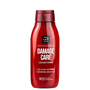 Frasco vermelho de condicionador da linha Damage Care da marca Mise en Scène, com rótulo preto destacando o nome do produto e a indicação de ser um condicionador de proteína.