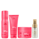 Produtos da linha Wella Professionals Color Brilliance, incluindo shampoo, condicionador e máscara em embalagens rosa vibrante, além de um frasco do óleo Oil Reflections Light