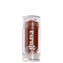 Produto de beleza Guava Skin em embalagem cilíndrica transparente, contendo barras de cor marrom em seu interior. O rótulo exibe o nome da marca "Guava" em destaque.