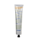 Tubo de bálsamo pós-barba refrescante da marca Korres, com embalagem branca e azul, contendo informações sobre os benefícios do produto para a pele sensível.