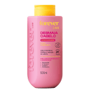 Frasco rosa com rótulo amarelo da linha Forever Liss, contendo 500ml de condicionador para cabelos ressecados e desidratados, com fórmula ultra-hidratante e ação instantânea para redução de volume.