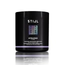 Máscara matizadora perolada da linha #itblond da marca Stijl. Embalagem preta com detalhes em lilás. Rótulo com o nome do produto "Máscara Matizadora Perolado" e descrição "Neutraliza os tons amarelados" em português e inglês.