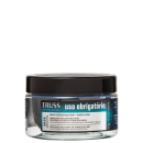 A imagem mostra a parte frontal do frasco, que é transparente, permitindo ver o produto dentro. O rótulo traz fundo azul e informações da marca, linha e benefícios do produto nas cores branca e preta. Tampa preta de rosquear.