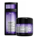 O produto de beleza da marca TRUSS apresenta um frasco preto com rótulo roxo, contendo um shampoo antioxidante para cabelos loiros. Também há um pote preto com rótulo roxo, contendo um creme reestruturante para cabelos loiros.