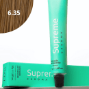 A imagem mostra a embalagem em tubo plástico verde claro com o nome da marca e produto impresso. Caixa retangular verde com detalhes do produto, incluindo a cor e o volume de 50g. No canto superior há uma pequena mecha com o tom da coloração.