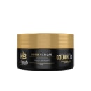 Produto capilar da linha Golden Liss da marca H-Beauty Professional. Máscara ou tratamento para alisar e reduzir o volume e frizz dos cabelos. Na frente do pote, há o logotipo da marca H-Beauty e o nome do produto "HBTOX Capilar Golden Liss"