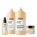 Produtos da linha Absolut Repair da L'Oréal Professionnel, incluindo shampoo, condicionador e óleo capilar em embalagens com cores predominantes bege e branco.
