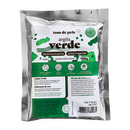 Argila verde da marca Tom de Pele. O pacote contém 100g de argila verde, que é descrita como desintoxicante e adstringente, sendo um produto 100% natural e vegano. A embalagem também apresenta informações sobre o modo de uso e os ingredientes.