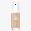 Frasco de maquiagem da linha True Match da L'Oréal Paris, com fórmula super-misturável e acabamento natural. Embalagem de vidro transparente com bomba dosadora e rótulo indicando a tonalidade C3 Cool Light Medium.