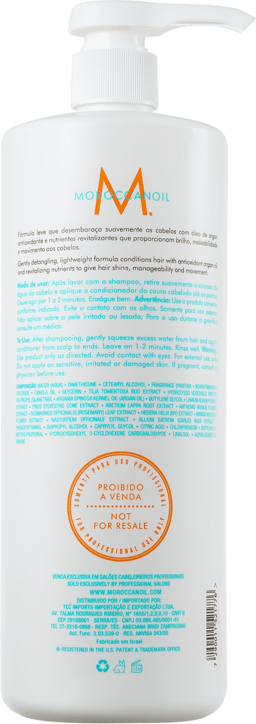 A imagem mostra a parte de trás do Condicionador Moroccanoil Extra Volume 1L. O rótulo é predominantemente em português, fornecendo informações sobre o produto, ingredientes, instruções de uso e avisos.