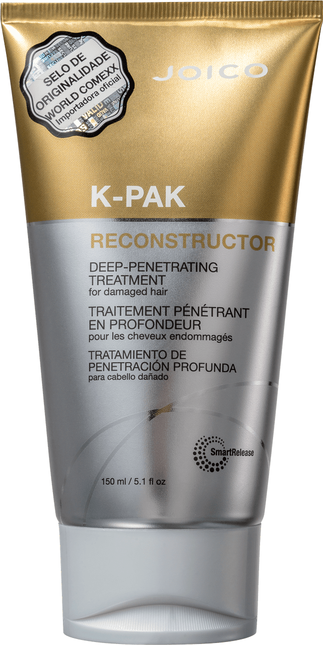 Trata-se de um frasco de tratamento capilar da marca Joico, chamado K-PAK Reconstructor. O produto é apresentado em uma embalagem dourada e prateada, com rótulo destacando suas propriedades de tratamento profundo e penetrante para cabelos danificados.