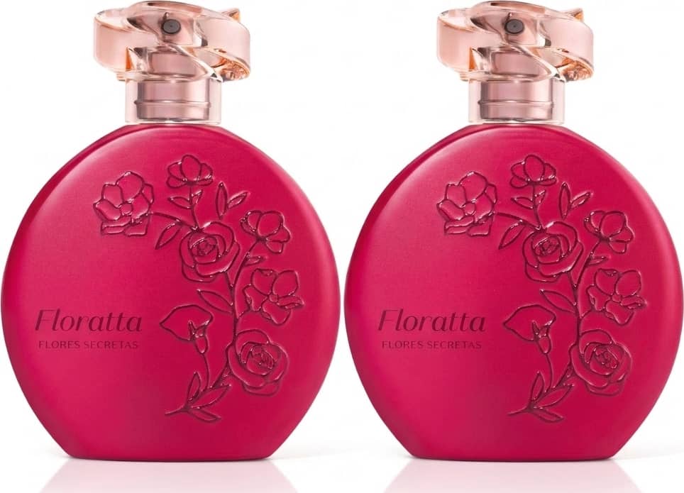 Dois frascos de item de perfumaria da marca Floratta Flores Secretas em formato redondo, cor rosa vibrante opaco com detalhes em relevo com flores estilizadas e tampa em acrílico rosado transparente e borrifador dourado posicionados lado a lado.