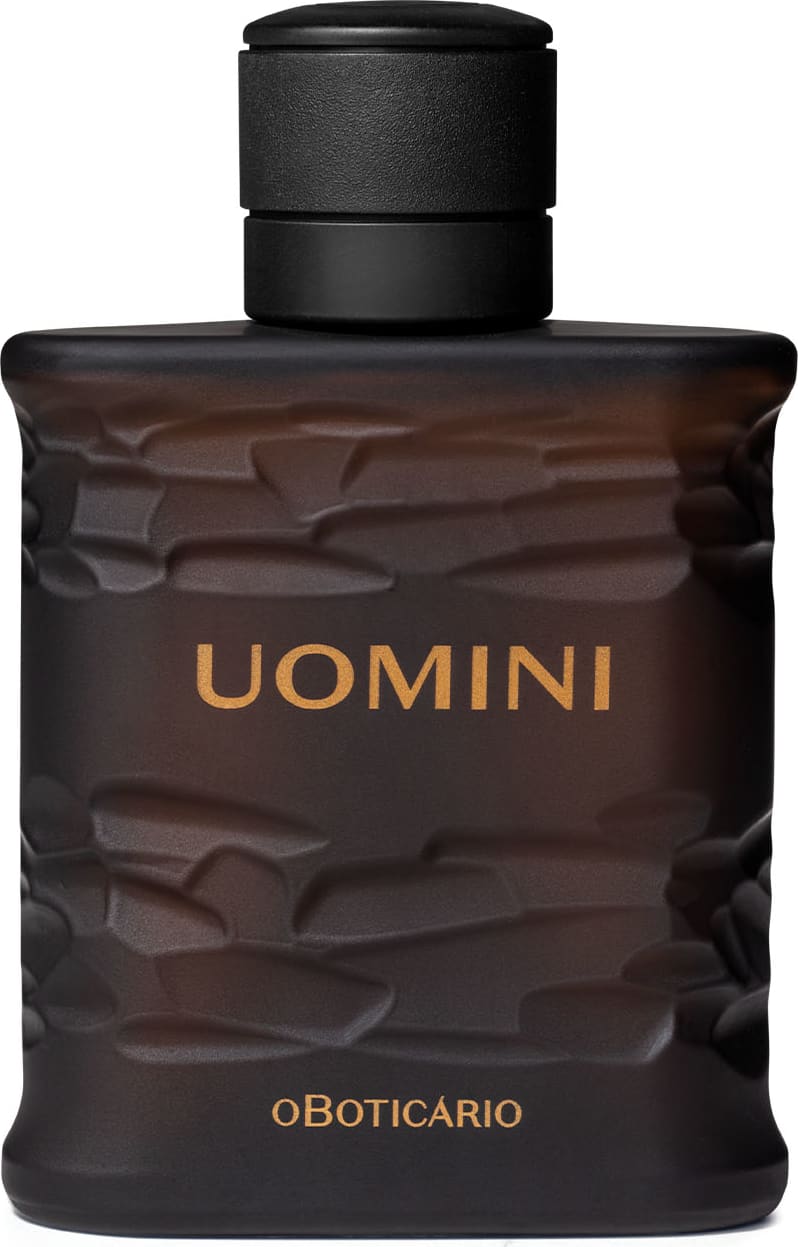 Frasco retangular marrom com texturas onduladas, tampa preta e letras bege, contendo 100ml de desodorante colônia da marca Uomini.