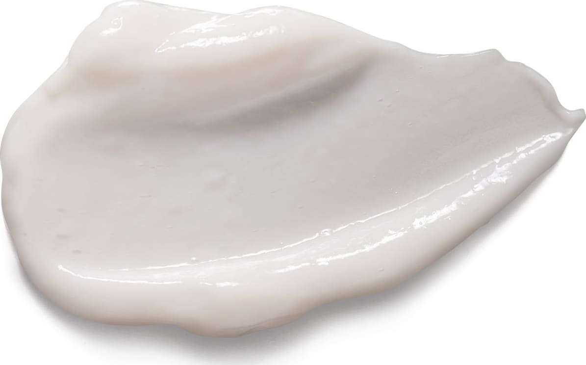 Textura cremosa, opaca e de cor branca do condicionador Match Hidratação Antifrizz. Tem aparência densa e uniforme, espalhada sobre superfície branca e lisa.