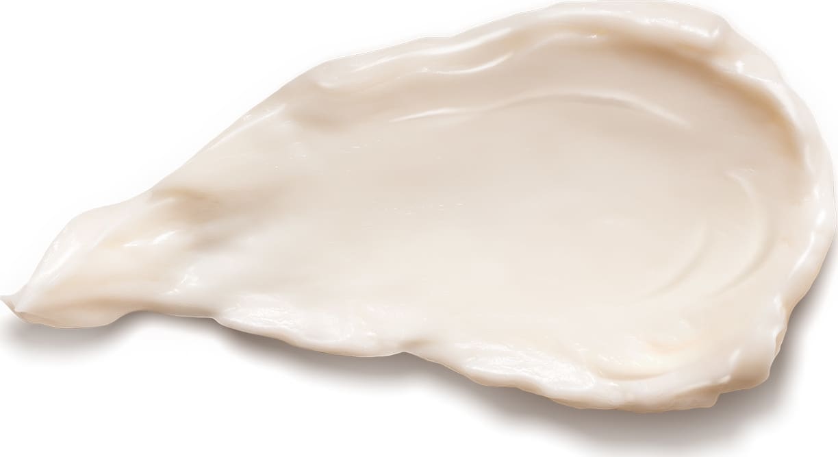 A textura do óleo em creme Nativa SPA Rosas Secretas apresenta uma aparência cremosa e aveludada, com uma consistência suave e sedosa. Sua cor predominante é um tom bege claro, com um brilho sutil.