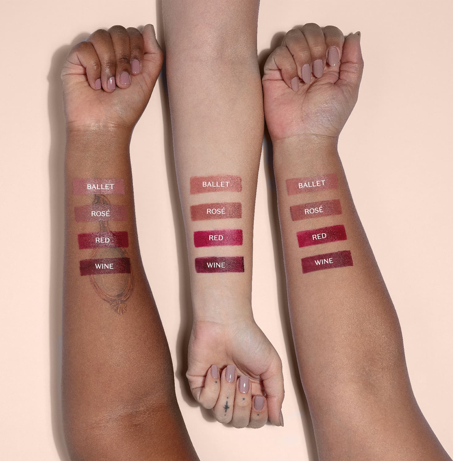 Três  braços de cores de peles diferentes e, em cada um deles, amostra das tonalidades do batom cremoso Make B. Urban Ballet mostrando como elas ficam.