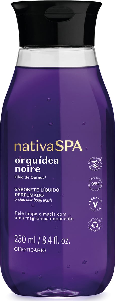 A imagem mostra um frasco de sabonete líquido perfumado Nativa SPA Orquídea Noire, na cor roxa, tampa preta e com rótulo destacando o nome e informações sobre o produto em letras douradas.