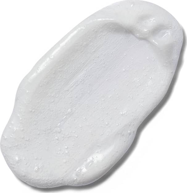 Imagem da textura cremosa e brilhante do condicionador Cuide-se Bem Feira Óleo de Coco, com superfície lisa e aspecto translúcido, em quantidade moderada sobre fundo branco.