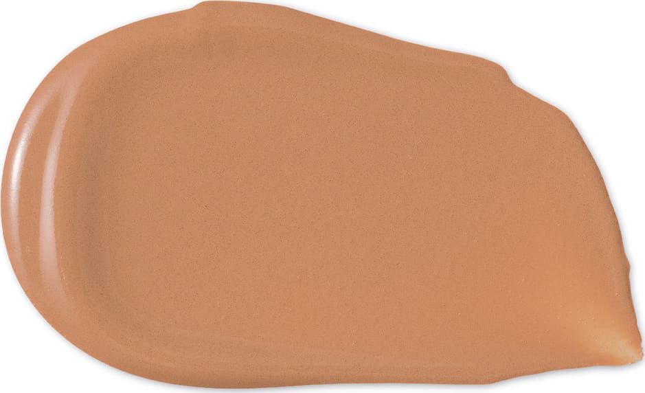 O produto de beleza apresenta uma textura cremosa e uniforme, com uma tonalidade alaranjada suave. Sua aparência é lisa e brilhante, sugerindo uma fórmula leve e de fácil aplicação.