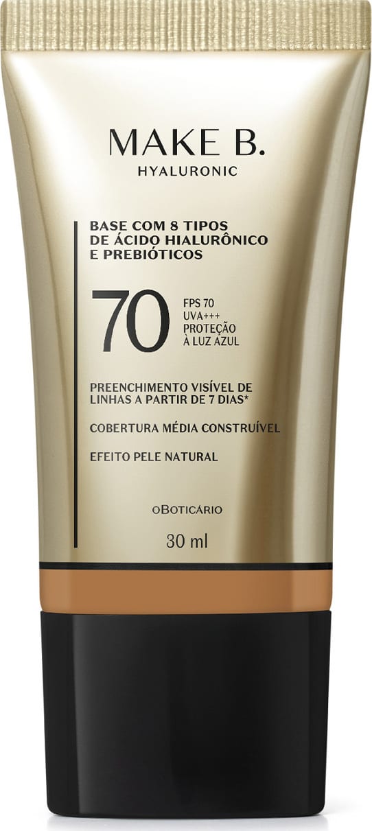 Frasco de base com 8 tipos de ácido hialurônico e probióticos da marca Make B., com FPS 70, UVA+++ e proteção à luz azul. Embalagem em tons de bege e preto, com informações sobre o produto.