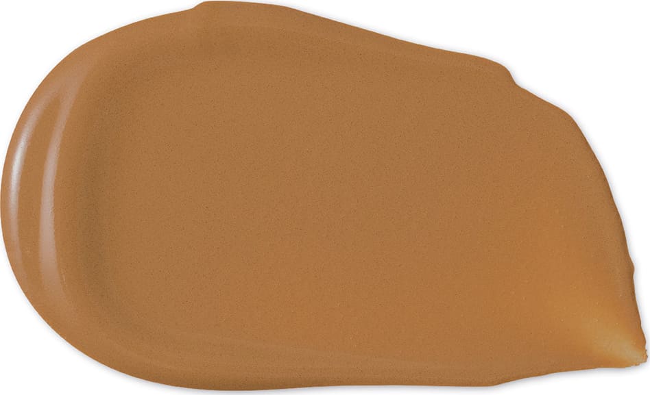 Trata-se de um produto de maquiagem da marca Make B., com uma textura cremosa e tom de pele dourado em uma embalagem simples e minimalista.