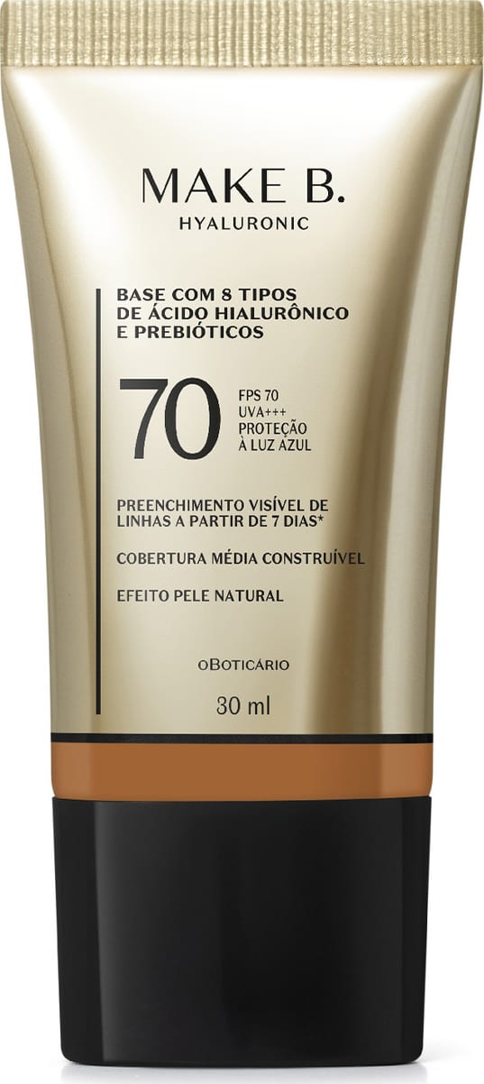 Frasco de base com 8 tipos de ácido hialurônico e probióticos da marca Make B., com FPS 70, UVA+++ e proteção à luz azul. Embalagem em tons de bege e preto, com informações sobre o produto.
