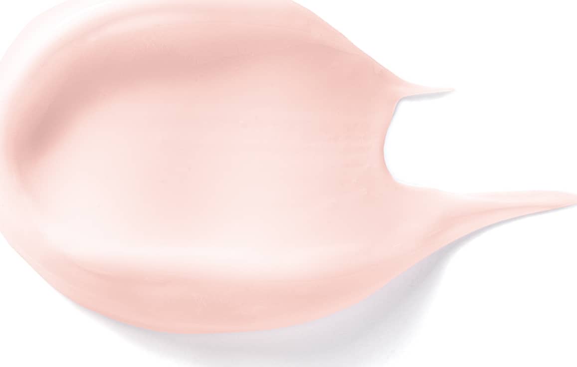 Imagem da textura suave e cremosa de creme acetinado corporal L'eau de Lily Soleil, com acabamento brilhante e superfície lisa, em tons de bege claro.
