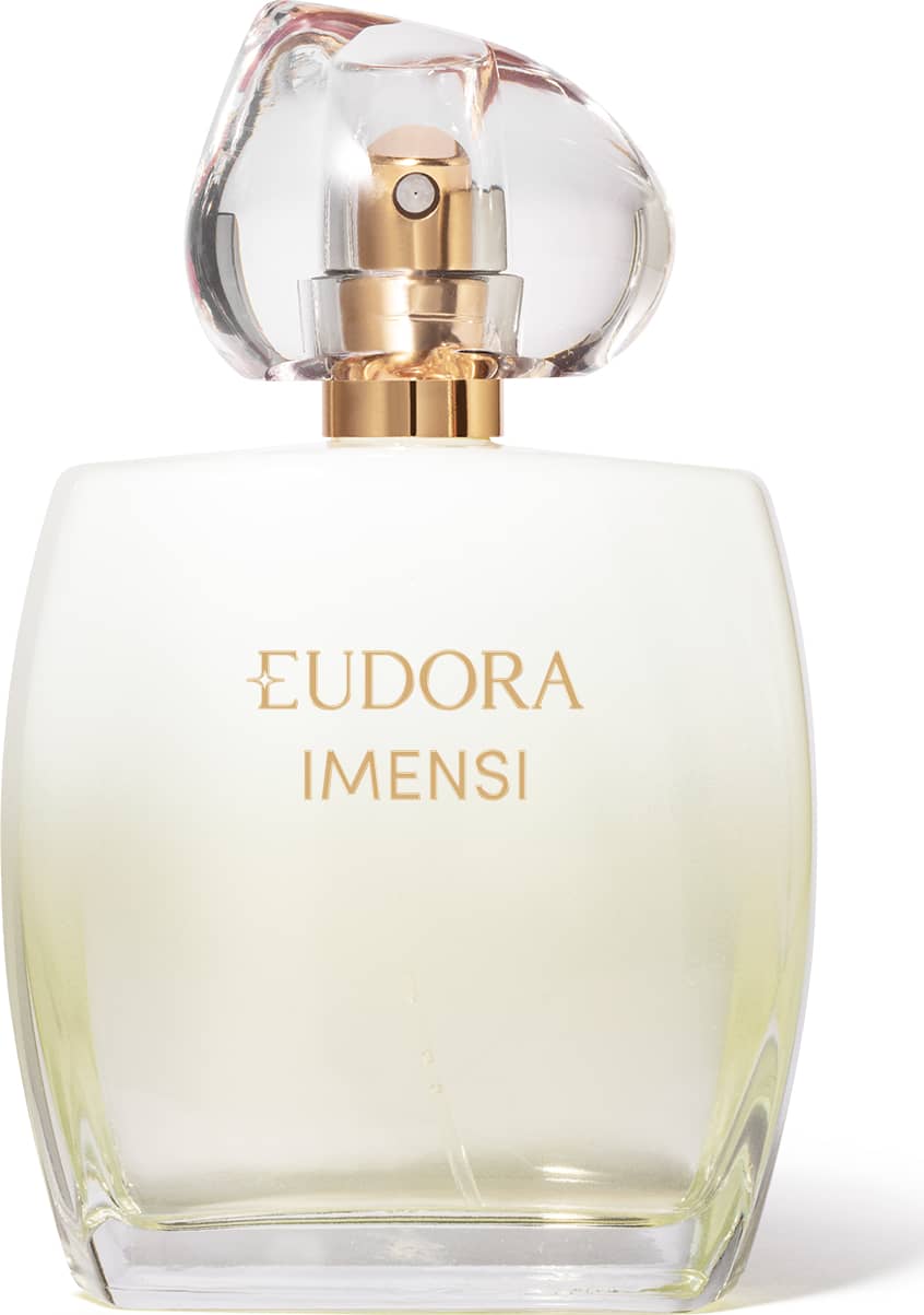 Frasco de vidro transparente degradê amarelo claro. Tampa dourada com vidro em forma de pedra translúcida. Rótulo em letras douradas no contraste amarelo e branco.