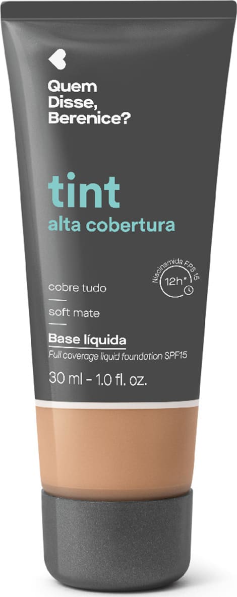 Bisnaga cinza escura com faixa bege de base líquida da marca Quem Disse, Berenice? com acabamento soft mate, com texto em destaque na cor azul indicando "tint alta cobertura".