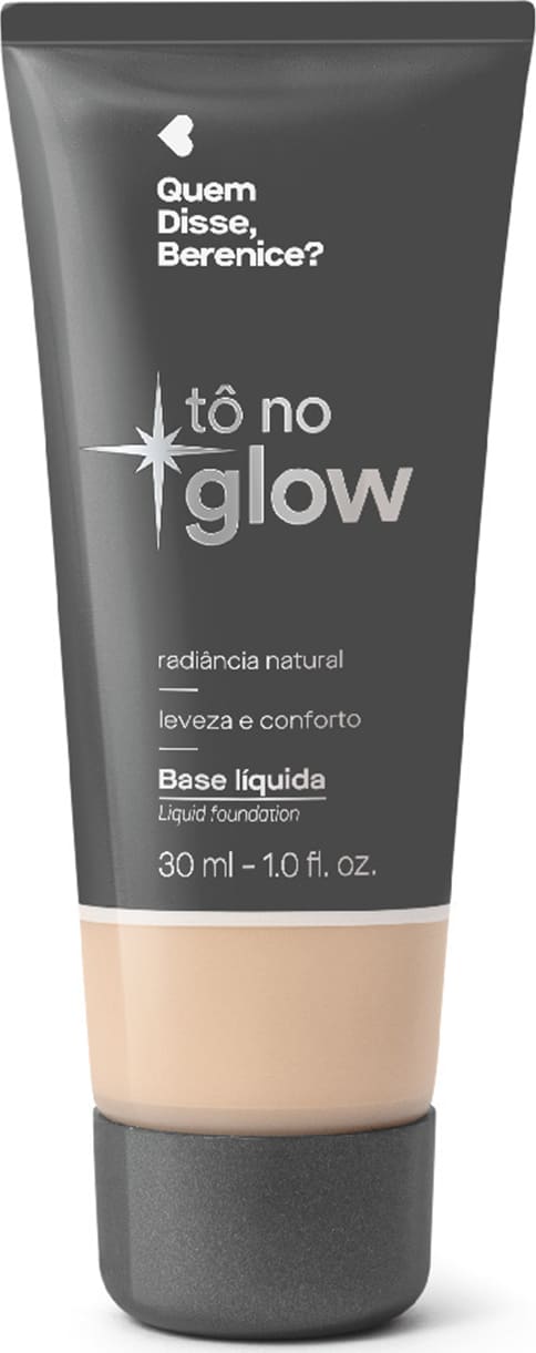 Bisnaga cinza de base líquida da marca Tô no Glow Quem disse, Berenice?, com detalhe na cor da base na parte inferior da embalagem e texto branco branco no rótulo.